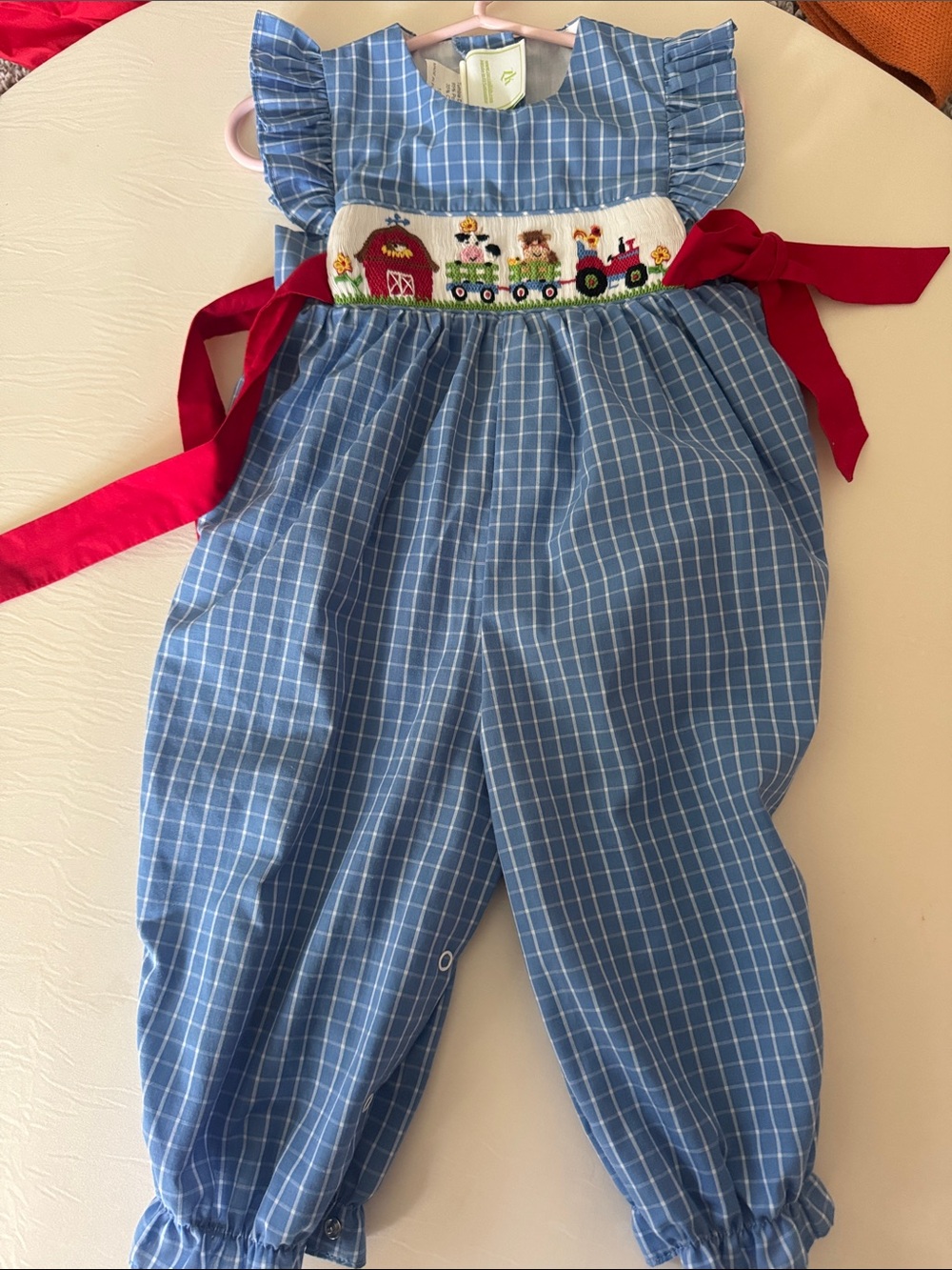 Blue Checked Smocked Farm-Scene Girls' Romper with Red Sash